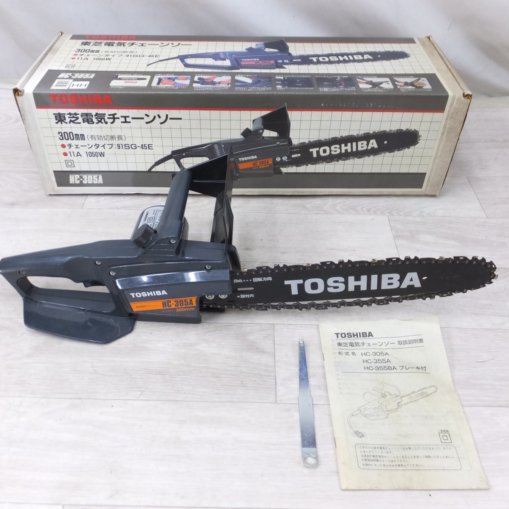送料無料] キレイ◇東芝 100V 電気 チェーンソー 300mm HC-305A