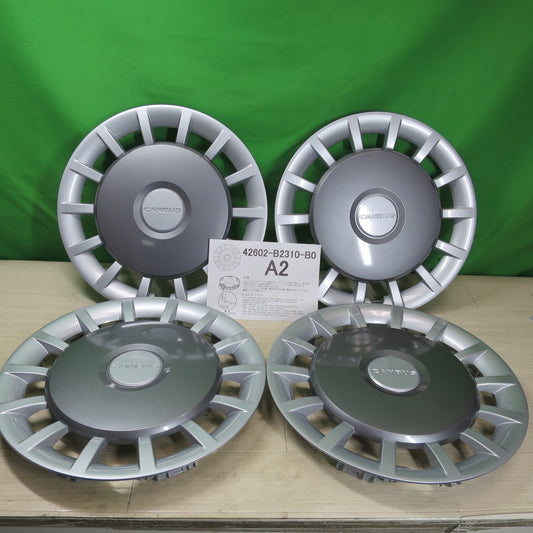 [送料無料] 未使用！4枚価格☆ダイハツ LA850S LA860S ムーブ キャンバス Gグレード 純正 ホイール カバー キャップ 14インチ 42602-B2310-B0 シルバー グレー☆