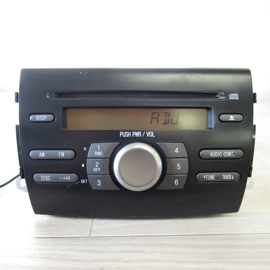 [送料無料] ◇ダイハツ L175S ムーヴ 純正 カー オーディオ 86180-B2410 CQ-JD8601AK CD デッキ プレーヤー◇
