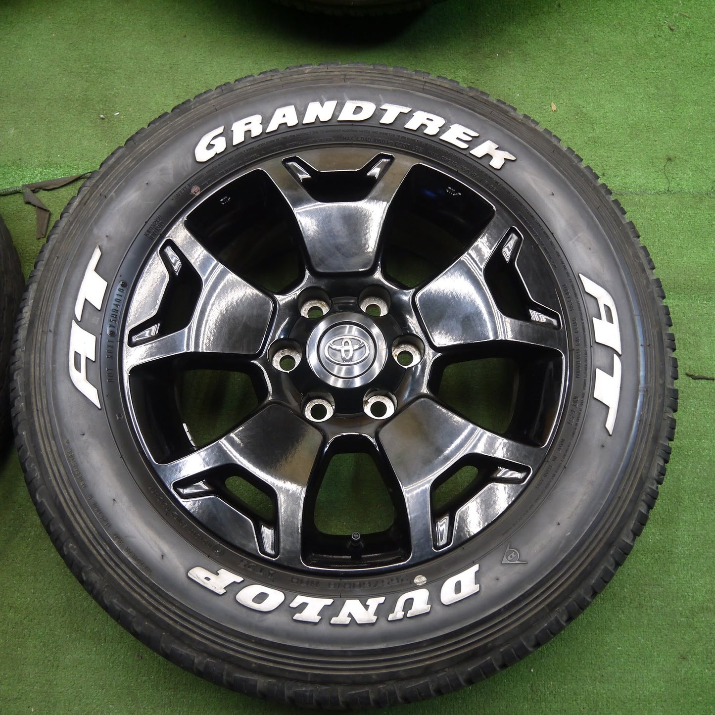 [送料無料]綺麗！4本価格★トヨタ ハイラックス サーフ 純正 265/60R18 ホワイトレター ダンロップ グラントレック AT25 PT PCD139.7/6H★3051001アノ